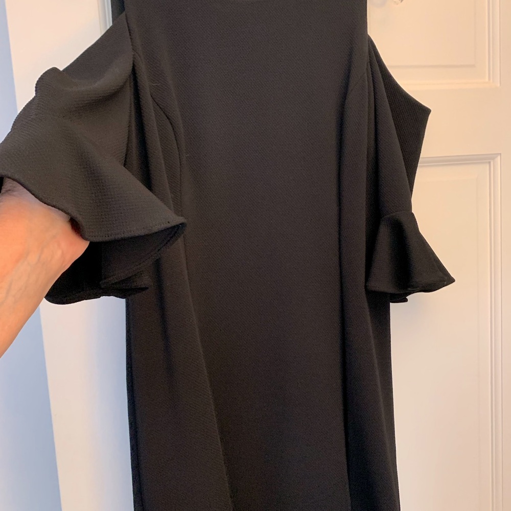 Black cocktail dress with cold shoulder